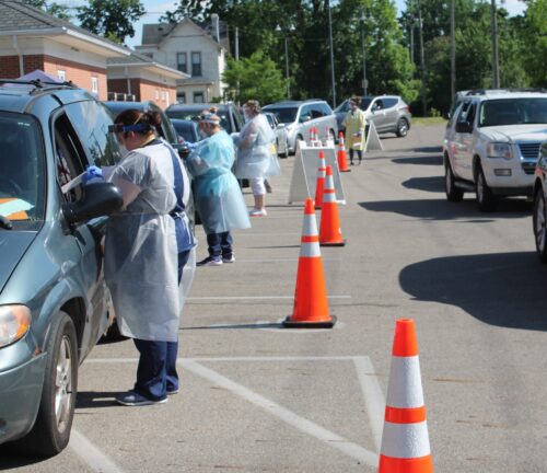 Rocking Horse providing medical services in a drive thru during covid-19